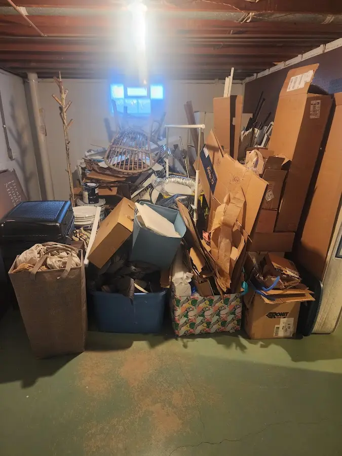 Roll-off dumpster container at job site for Roll Off Dumpster Rental in Rome